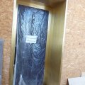 Облицовка входных групп латунью
